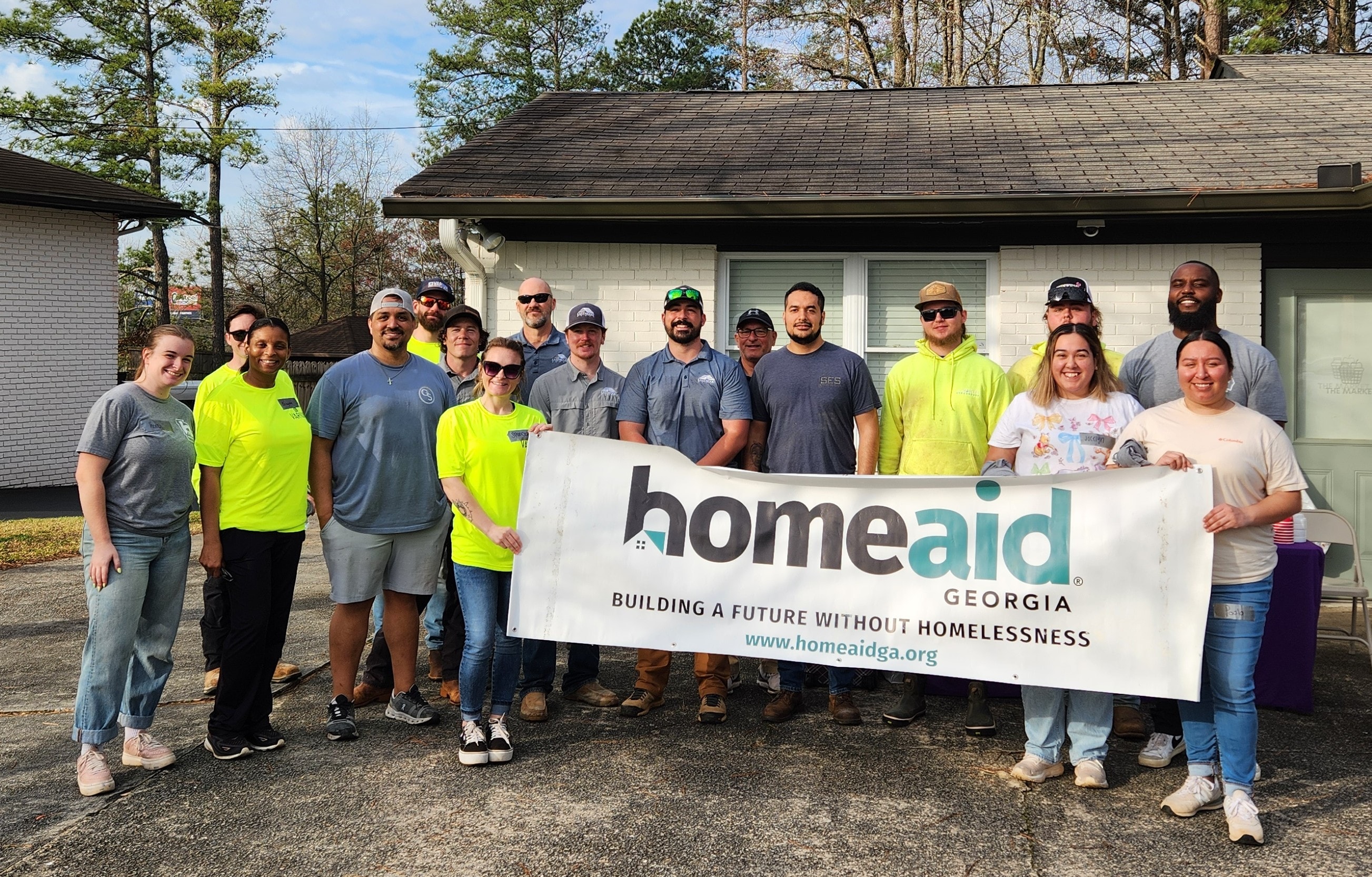 SES team volunteering with HomeAid Georgia